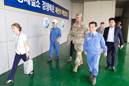 General Vincent K. Brooks, Commander of Combined Forces Command, is welcomed by POSCO staff as he enters one of POSCO’s blast furnaces which is currently the largest blast furnace in the world, June 28. 