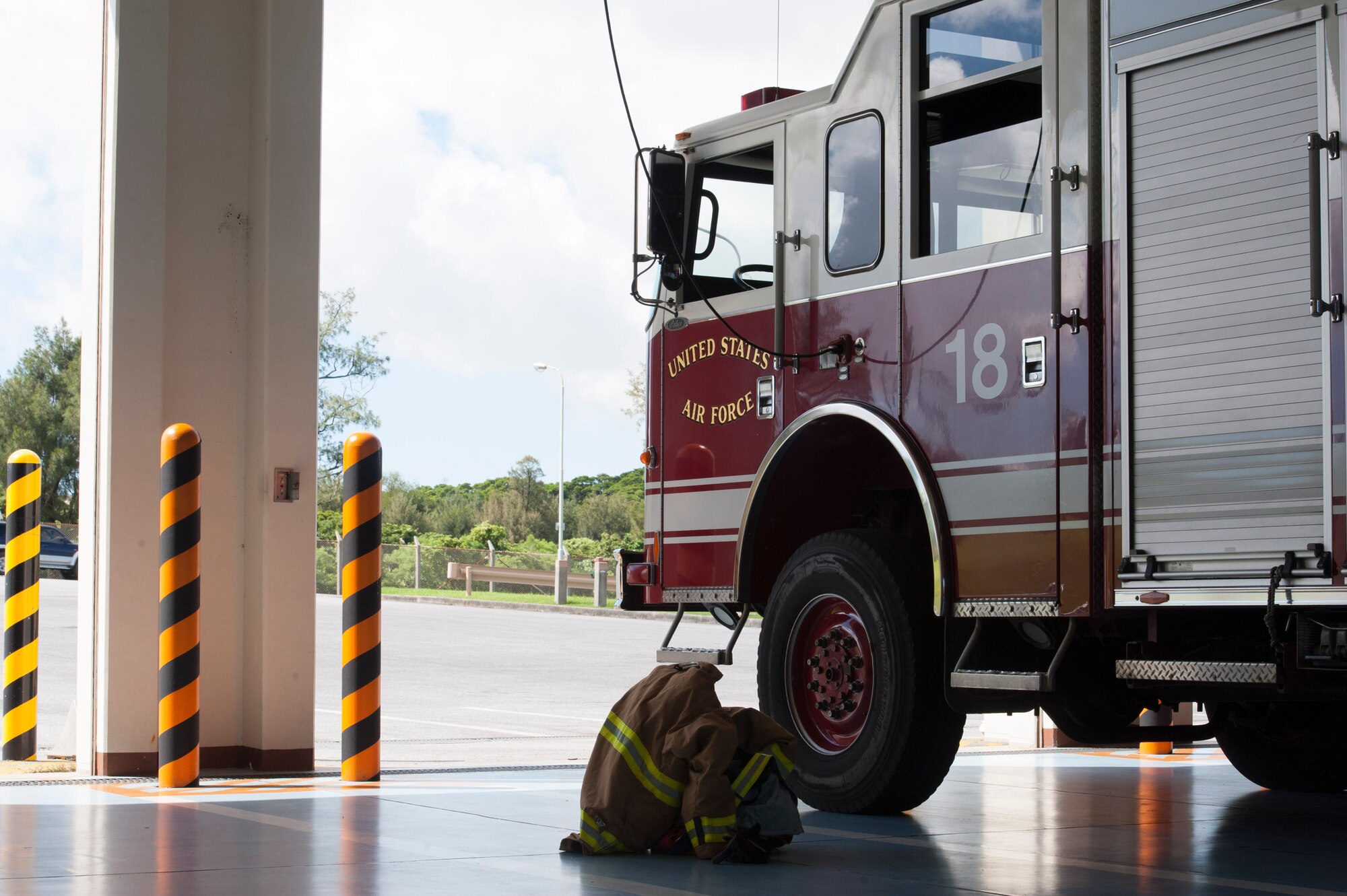 A U.S. Air Force 18th Civil Engineer Squadron firetruck sits ready for possible emergencies June 28, 2017, at Kadena Air Base, Japan. The 18th CES provides fire response services across Kadena, responding to inflight emergencies and domestic fires. (U.S Air Force photo by Senior Airman Quay Drawdy)