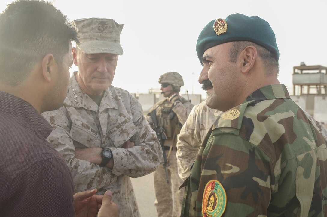 Gen. Joseph F. Dunford Jr., center-left, the chairman of the Joint Chiefs of Staff, speaks with Afghan National Army Brig. Gen. Ahmadzai, right, the commanding general of 215th Corps, at Bastion Airfield, Afghanistan, June 28, 2017. Dunford met with Marines assigned to Task Force Southwest to discuss the progress and challenges of the unit’s mission, which is to train, advise and assist the 215th Corps and the 505th Zone National Police. (U.S. Marine Corps photo by Sgt. Lucas Hopkins)