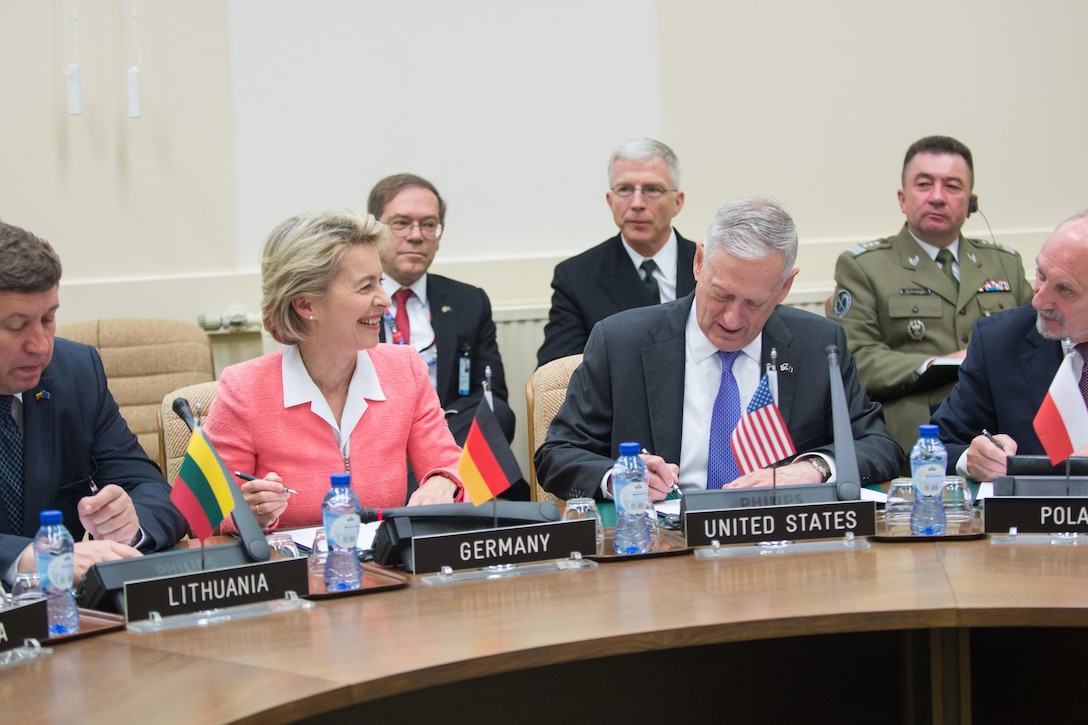 Defense Secretary Jim Mattis and partner nation defense leaders sign an enhanced forward presence declaration at NATO headquarters in Brussels, June 29, 2017. DoD photo by Air Force Staff Sgt. Jette Carr