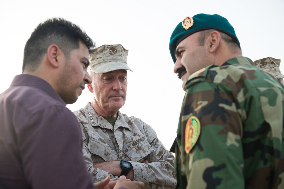 Marine Corps Gen. Joe Dunford, chairman of the Joint Chiefs of Staff, meets Afghan Gen. Wali Ahmadzia, commander, 215th Afghan National Army Maiwand Corps, after visiting the Train, Advise, Assist Command in Helmand Province, Afghanistan, June 28, 2017. DoD Photo by Army Sgt. James K. McCann