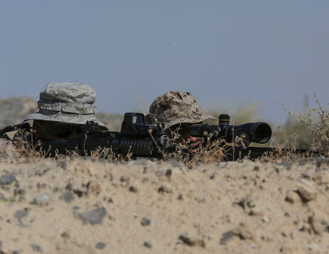 Saudi Arabian Naval Special Forces provide sniper support for U.S. Marines with Charlie Company, 1st Battalion, 7th Marine Regiment, Special Purpose Marine Air-Ground Task Force-Crisis Response-Central Command , during a subject matter expert exchange in Saudi Arabia, May 15, 2017. The exchange proved to be an enhancing opportunity for both the U.S. and Saudi forces. Deploying U.S. Marines into the U.S. Central Command area of responsibility to conduct combined military training with our partner nations’ security forces strengthens our vital relationships with partners in this important region. (U.S. Marine Corps photo by Cpl. Kyle McNan)