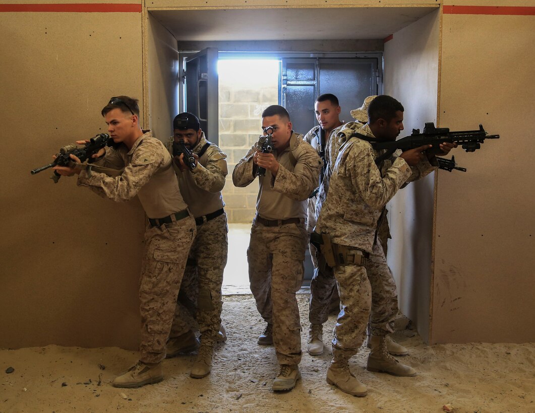 U.S. Marines with Charlie Company , 1st Battalion, 7th Marine Regiment, Special Purpose Marine Air-Ground Task Force-Crisis Response-Central Command and Saudi Arabian Naval Special Forces practice room clearing during a subject matter expert exchange in Saudi Arabia, May 15, 2017. The exchange proved to be an enhancing opportunity for both the U.S. and Saudi forces. Deploying U.S. Marines into the U.S. Central Command area of responsibility to conduct combined military training with our partner nations’ security forces strengthens our vital relationships with partners in this important region. (U.S. Marine Corps photo by Cpl. Kyle McNan)
