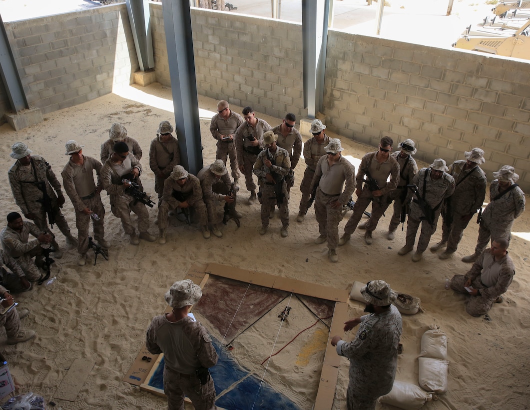 U.S. Marines with Charlie Company, 1st Battalion, 7th Marine Regiment, Special Purpose Marine Air-Ground Task Force-Crisis Response-Central Command and Saudi Arabian Naval Special Forces prepare for a night raid during a subject matter expert exchange in Saudi Arabia, May 16, 2017. The exchange proved to be an enhancing opportunity for both the U.S. and Saudi forces. Deploying U.S. Marines into the U.S. Central Command area of responsibility to conduct combined military training with our partner nations’ security forces strengthens our vital relationships with partners in this important region. (U.S. Marine Corps photo by Cpl. Kyle McNan) 