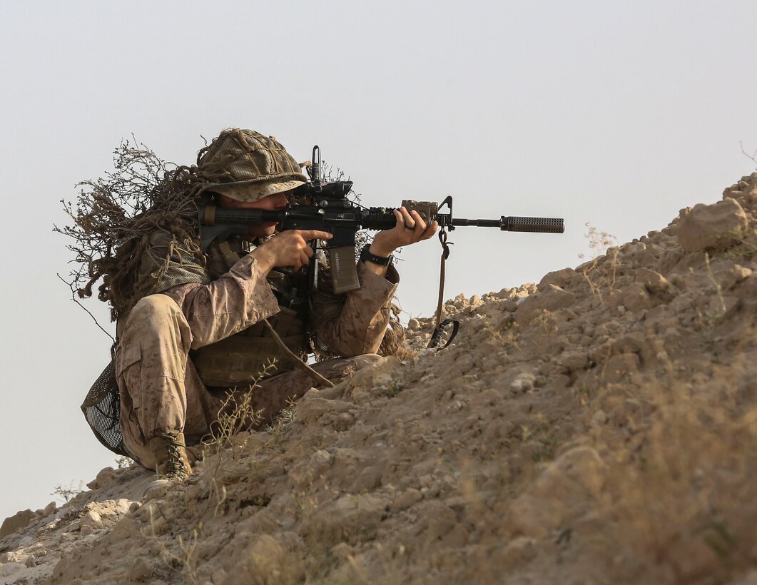 U.S. Marine Corps Cpl. Brock Legant, a scout sniper with Charlie Company, 1st Battalion, 7th Marine Regiment, Special Purpose Marine Air-Ground Task Force-Crisis Response-Central Command, provides over watch during a subject matter expert exchange with Saudi Arabian Naval Special Forces in Saudi Arabia, May 17, 2017. The exchange proved to be an enhancing opportunity for both the U.S. and Saudi forces. Deploying U.S. Marines into the U.S. Central Command area of responsibility to conduct combined military training with our partner nations’ security forces strengthens our vital relationships with partners in this important region. (U.S. Marine Corps photo by Cpl. Kyle McNan) 