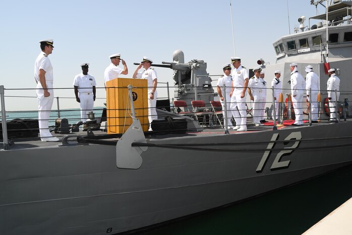 170617-N-XP344-057 MANAMA, Bahrain (June 27, 2017) From left, Lt. Cmdr. Timothy Yuhas, a native of Cave Creek, Arizona and former commanding officer of the Cyclone-class coastal patrol ship USS Thunderbolt (PC 12), salutes Lt. Cmdr. Michael T. McArawas, a native of Erie, Pennsylvania and current commanding officer, during a change of command ceremony held shipboard while pierside at Naval Support Activity Bahrain. Thunderbolt is one of 10 PCs forward deployed to Manama, Bahrain, whose mission is coastal patrol and interdiction surveillance. (U.S. Navy photo by Mass Communication Specialist 2nd Class Victoria Kinney)