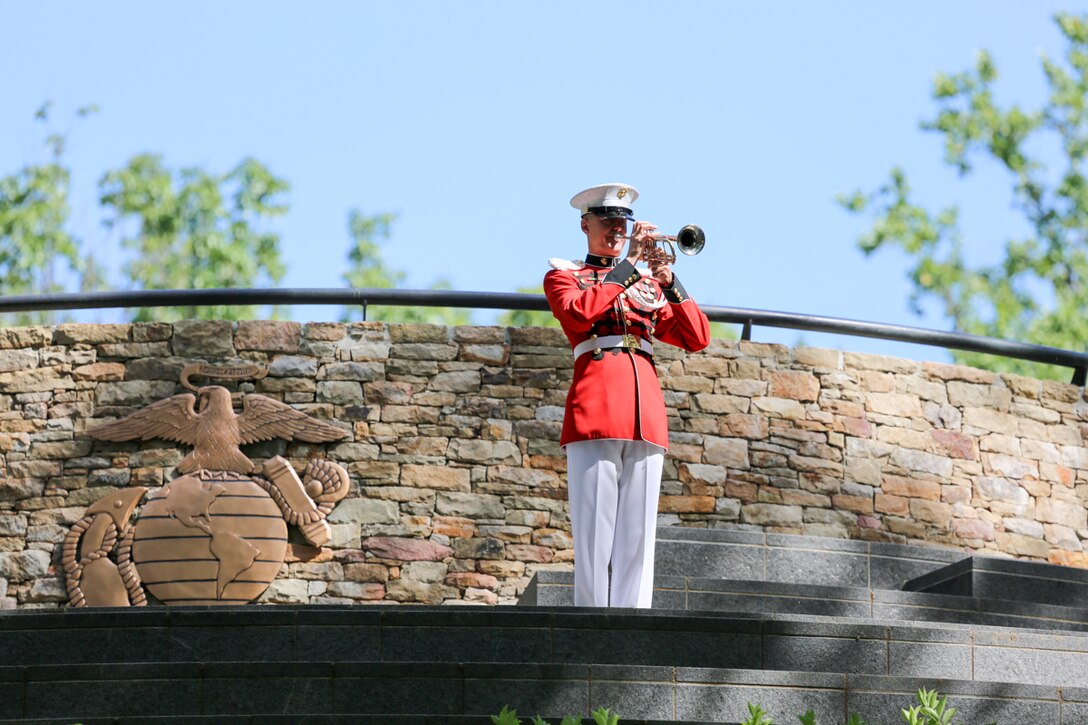 On Wednesday, June 28, 2017, members of the Marine Band supported a wreath-laying ceremony in honor of the Marines who fought in the Korean War. President Moon Jae-in of the Republic of Korea honored the Marines at the Korean War Chosin Monument at the National Museum of the Marine Corps. In 1950, President Moon's parents were able to flee to South Korea after the 1st Marine Division drove the enemy back. Today, he showed his gratitude for all the Marine Corps did for his family. (U.S. Marine Corps photo by Gunnery Sgt. Rachel Ghadiali/released)