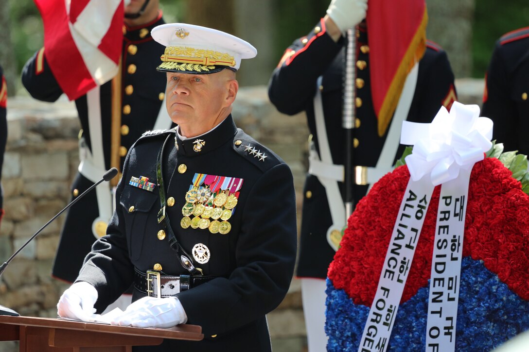 On Wednesday, June 28, 2017, members of the Marine Band supported a wreath-laying ceremony in honor of the Marines who fought in the Korean War. President Moon Jae-in of the Republic of Korea honored the Marines at the Korean War Chosin Monument at the National Museum of the Marine Corps. In 1950, President Moon's parents were able to flee to South Korea after the 1st Marine Division drove the enemy back. Today, he showed his gratitude for all the Marine Corps did for his family. (U.S. Marine Corps photo by Gunnery Sgt. Rachel Ghadiali/released)