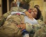 Capt. Latisha Collier, a mobilization readiness officer assigned to the 335th Signal Command (Theater) gives a warm welcome home hug to Maj. Frank Trinidad, deputy J6, Detachment 1, 335th SC (T) at the Killeen Regional Airport, Killeen,Texas June 28.  Trinidad and 11 other Soldiers returned from a nine-month deployment where their mission was providing communications support to a special operations joint task force, as part of Operation Inherent Resolve. (Official U.S. Army Reserve photo by Sgt. 1st Class Brent C. Powell)