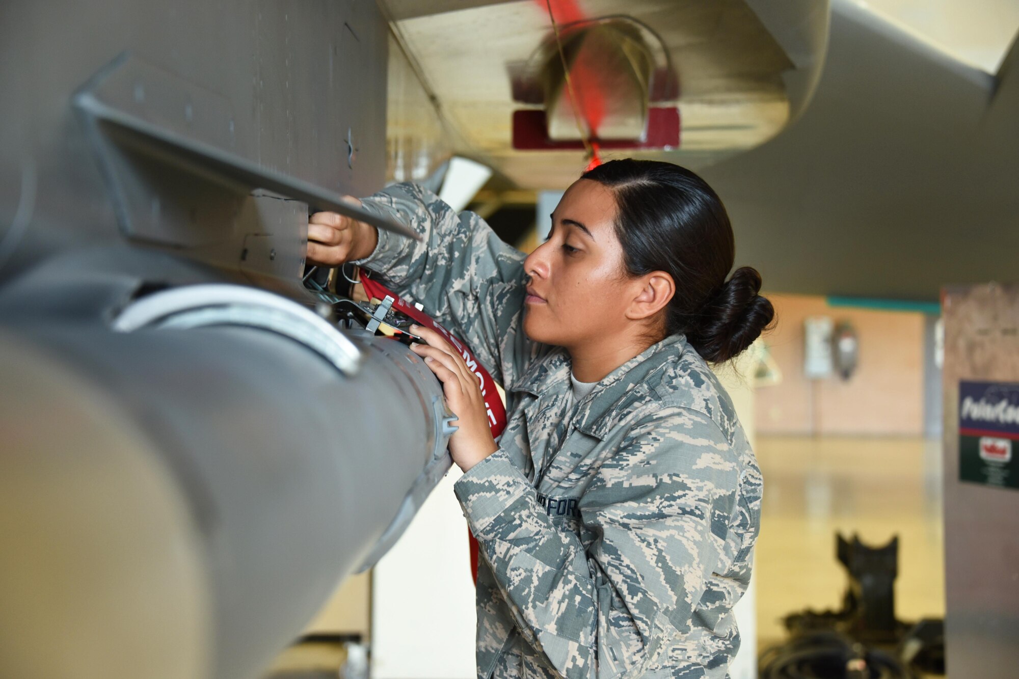 Airman Tyana Haylock, 363rd Training Squadron F-15 Eagle aircraft armament systems apprentice student inspects munitions launch, release, suspension, and monitor systems and associated handling and loading equipment at Sheppard Air Force Base, Texas. The 363rd Training Squadron provides training for armament, munitions, nuclear weapons and maintenance scheduling and analysis. (U.S. Air Force photo/Liz H. Colunga)