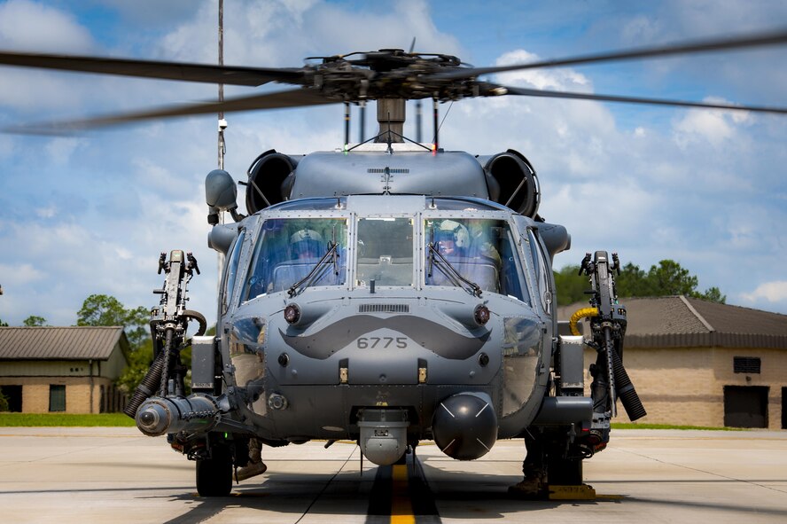 Col. Thomas Kunkel, 23d Wing commander, left, and Capt. Evan McNeal, 41st Rescue Squadron C-flight commander, prepare for take-off during Kunkel’s fini-flight, June 27, 2017, at Moody Air Force Base, Ga. The fini-flight is a long-standing Air Force tradition that occurs when a pilot departs from the base. Upon completion of their final flights, military aviators are hosed down with water or champagne by their family and friends before they depart their unit. (U.S. Air Force photo by Airman 1st Class Lauren M. Sprunk)