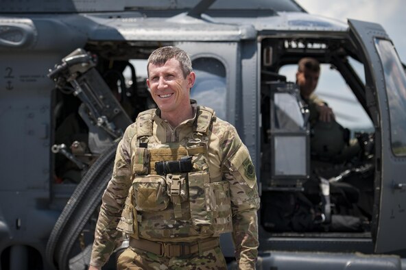Col. Thomas Kunkel, 23d Wing commander, walks toward family and friends after completing his fini-flight, June 27, 2017, at Moody Air Force Base, Ga. The fini-flight is a long-standing Air Force tradition that occurs when a pilot departs from the base. Upon completion of their final flights, military aviators are hosed down with water or champagne by their family and friends before they depart their squadron. (U.S. Air Force photo by Airman 1st Class Lauren M. Sprunk)