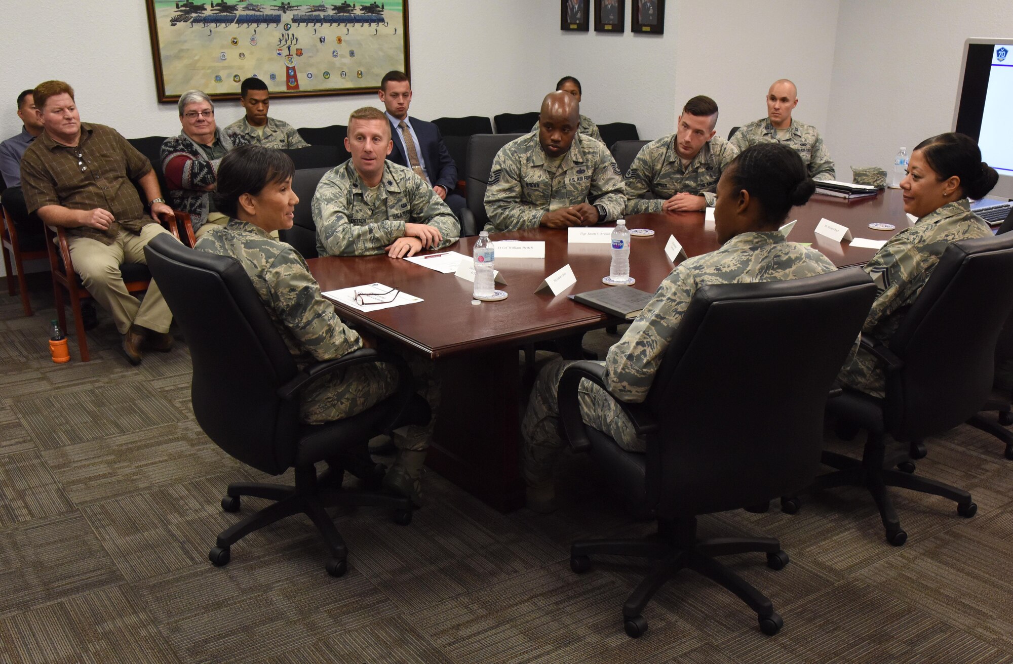 Col. Debra Lovette, 81st Training Wing commander, receives a briefing from the Judge Advocate Office during a Wing Staff Agency orientation tour at the Sablich Center June 27, 2017, on Keesler Air Force Base, Miss. The tour familiarized Lovette with the Wing Staff Agency mission, operations and personnel. (U.S. Air Force photo by Kemberly Groue)