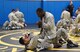 Senior Airman Jerome Scurry (top), 512th Security Forces Squadron reservist, wrestles with another trainee during Phoenix Raven training June 15, 2017, at Joint Base McGuire-Dix-Lakehurst, New Jersey.Raven training includes instruction and realistic practical exercises in antiterrorism and force protection, weapon system security, verbal judo, combatives, tactical baton employments and advanced firearms proficiency. (U.S. Air Force photo/Master Sgt. Jaimie Powell)