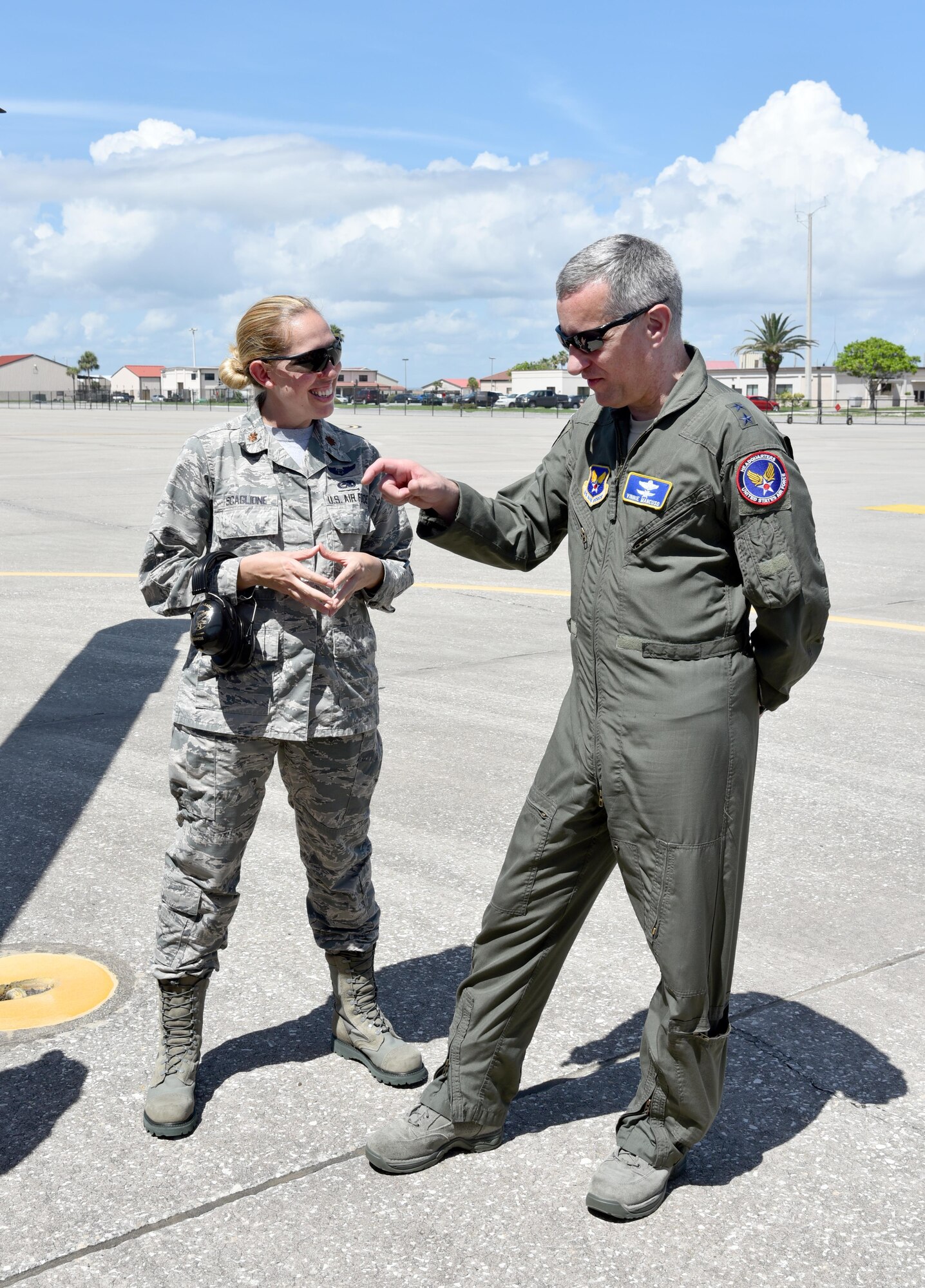 Maj. Gen. Vincent Mancuso, right, Air Staff deputy director, Pentagon, talks with Maj. Sarah Scaglione, 920th Aircraft Maintenance Squadron commander, during a tour of an HH-60G Pave Hawk helicopter June 23, 2017 on the flight line at Patrick Air Force Base, Florida. During the general’s visit of the 920th Rescue Wing, he received a mission briefing, toured the 308th Rescue Squadron Guardian Angels facility and visited with HC-130 and HH-60G aviators and maintainers. (U.S. Air Force photo/Tech. Sgt. Lindsey Maurice)