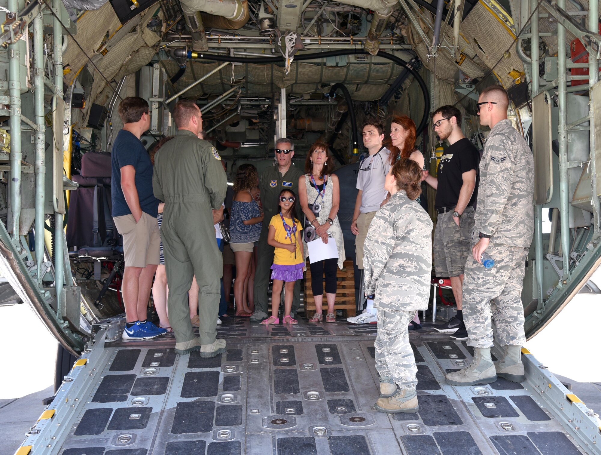 Aviators and maintainers of the 920th Rescue Wing discuss the capabilities of the HC-130 Hercules and its contributions to the rescue mission to Maj. Gen. Vincent Mancuso, middle, Air Staff deputy director, Pentagon, and his guests June 23, 2017 in the back of an HC-130 on the Patrick Air Force Base, Florida, flight line. During the general’s visit of the 920th Rescue Wing, he received a mission briefing, toured the 308th Rescue Squadron Guardian Angels facility and visited with HC-130 and HH-60G aviators and maintainers. (U.S. Air Force photo/Tech. Sgt. Lindsey Maurice)