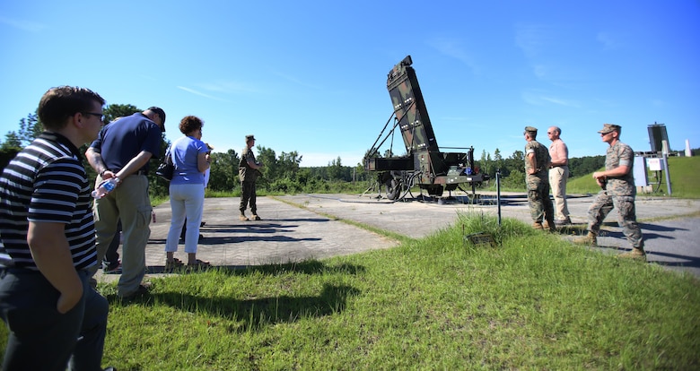 Marines assigned to Marine Air Control Squadron 2 showcase the Ground/Air Task Oriented Radar to personnel from Program Executive Officer Land Systems aboard Marine Corps Air Station Cherry Point, N.C., June 28, 2017. The Marines demonstrated how the G/ATOR integrates with two other new systems, the Common Aviation Command and Control System and the Composite Tracking Network, to provide faster and more accurate data to Marine Air-Ground Task Force commanders, improving their situational awareness and decision making ability. MACS-2 is part of Marine Air Control Group 28, 2nd Marine Aircraft Wing. (U.S. Marine Corps Photo by Pfc. Skyler Pumphret/ Released)