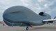The RQ-4 Global Hawk worked on by Team Robins maintenance professionals sits on the base flight line June 29, 2017. A special ribbon cutting ceremony, signaling the early completion of work on the first RQ-4 Global Hawk at Robins Air Force Base, Ga., was held June 29. Robins is the first and only installation to have a building-based Launch and Recovery Element, allowing the aircraft to take off and land from this location. This is also the first time a Global Hawk has flown into an Air Force air logistics complex. Warner Robins Air Logistics Complex maintenance professionals meticulously painted the aircraft to prevent corrosion. (U.S. Air Force photo by Tech. Sgt. Kelly Goonan/released)