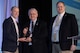 Mr. George Schmitt, Director of International Programs in AFRL’s Materials and Manufacturing Directorate, receives the inaugural SAMPE North America Organizational Excellence Award on behalf of the Directorate from Mr. Ben Dietsch, Executive Vice President, and Mr. Rick Willardson, President of SAMPE. (Courtesy photo/SAMPE)