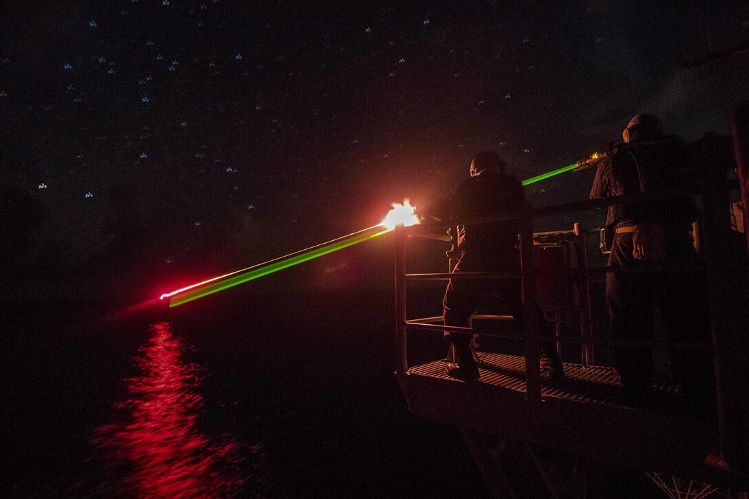 Sailors fire an M240B machine gun during a live-fire training exercise aboard the guided-missile cruiser USS Princeton in the Pacific Ocean, June 27, 2017. Navy photo by Petty Officer 3rd Class Kelsey J. Hockenberger
