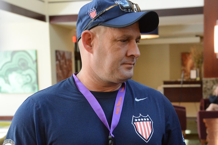 Jessie White, a retired Army staff sergeant, arrives in London to compete in the Invictus Games Sept. 5, 2014. White now serves as the coach for the Army and Navy archery teams and will oversee the archery events during the Warrior Games in Chicago, June 30-July 8, 2017. DoD photo by David Vergun