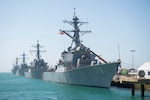 The Arleigh Burke-class guided-missile destroyers USS Porter (DDG 78), front, USS Donald Cook (DDG 75), USS Carney (DDG 64) and USS Ross (DDG 71) are moored at Naval Station Rota, Spain.