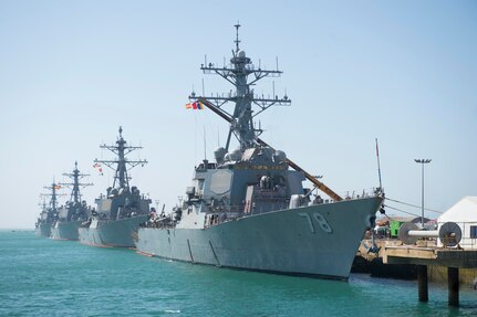 The Arleigh Burke-class guided-missile destroyers USS Porter (DDG 78), front, USS Donald Cook (DDG 75), USS Carney (DDG 64) and USS Ross (DDG 71) are moored at Naval Station Rota, Spain.