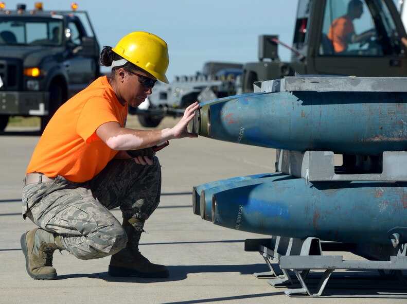 Airman 1st Class Benicia Burnette, 5th Munitions Squadron conventional maintenance specialist, assembles a BDU-56 bomb at Minot Air Force Base, N.D., June 20, 2017. The Airmen trained for Global Strike Challenge 2017. (U.S. Air Force Photo by Staff Sgt. Chad Trujillo)
