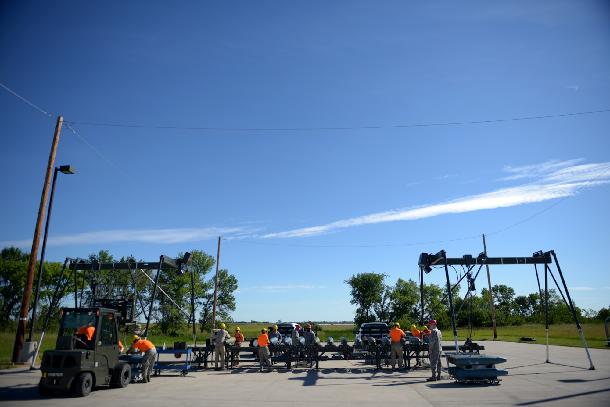Airmen from the 5th Munitions Squadron assembles BDU-56 bombs during Global Strike Challenge at Minot Air Force Base, N.D., June 20, 2017. The munitions assembly was part of many events during Global Strike Challenge 2017. (U.S. Air Force Photo by Staff Sgt. Chad Trujillo)