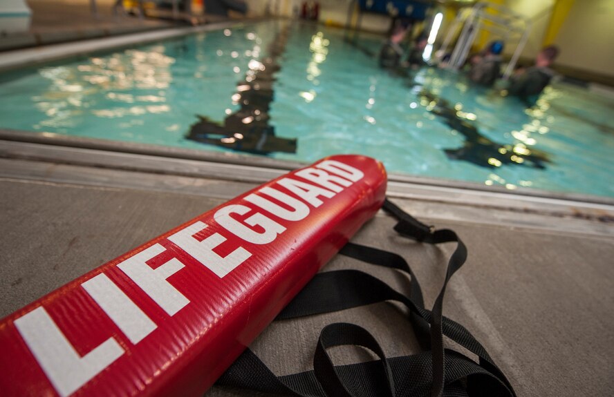 Members of the 54th Helicopter Squadron engage in underwater egress survival training at Minot Air Force Base, N.D., June 22, 2017. The training included demonstrations on how to escape a simulated helicopter crash and properly use common rescue devices used by all branches of the armed forces. (U.S. Air Force photo by Airman 1st Class Jonathan McElderry)