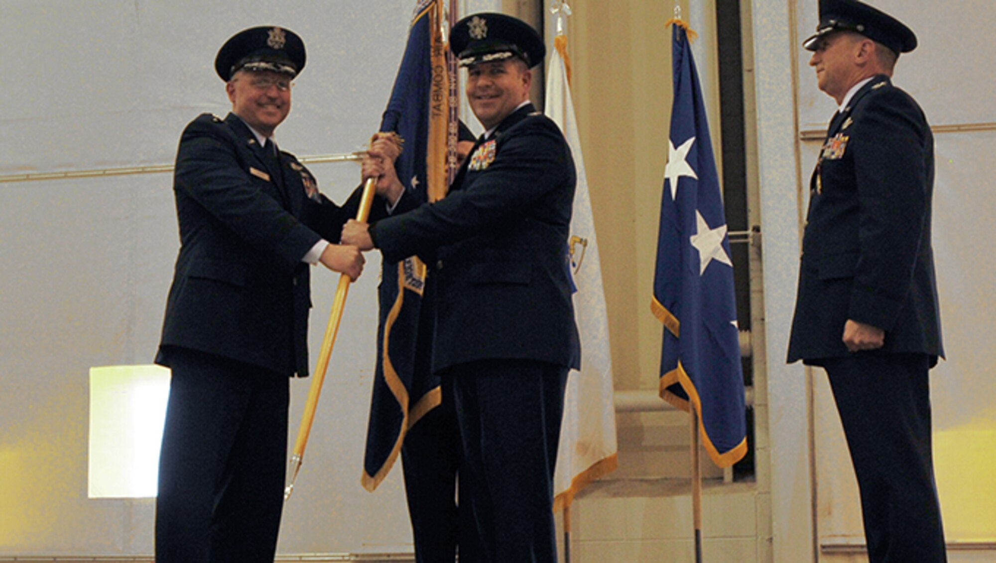 Col. James M. Suhr assumed command of the 104th Fighter Wing during a change of command ceremony held at Barnes Air National Guard Base, March 5, 2017. Suhr is the first active duty commander for the 104th Fighter Wing.  He is a dual status commander as both an active duty and Massachusetts National Guard officer as a part of an initiative known as Total Force Integration. 

 Suhr assumed command from Col. James J. Keefe who will take on greater leadership roles at the Massachusetts Joint Forces Headquarters serving as the Assistant Adjutant General for the Massachusetts Air National Guard.(U.S. Air National Guard Photo by Tech. Sgt. Melanie Casineau)