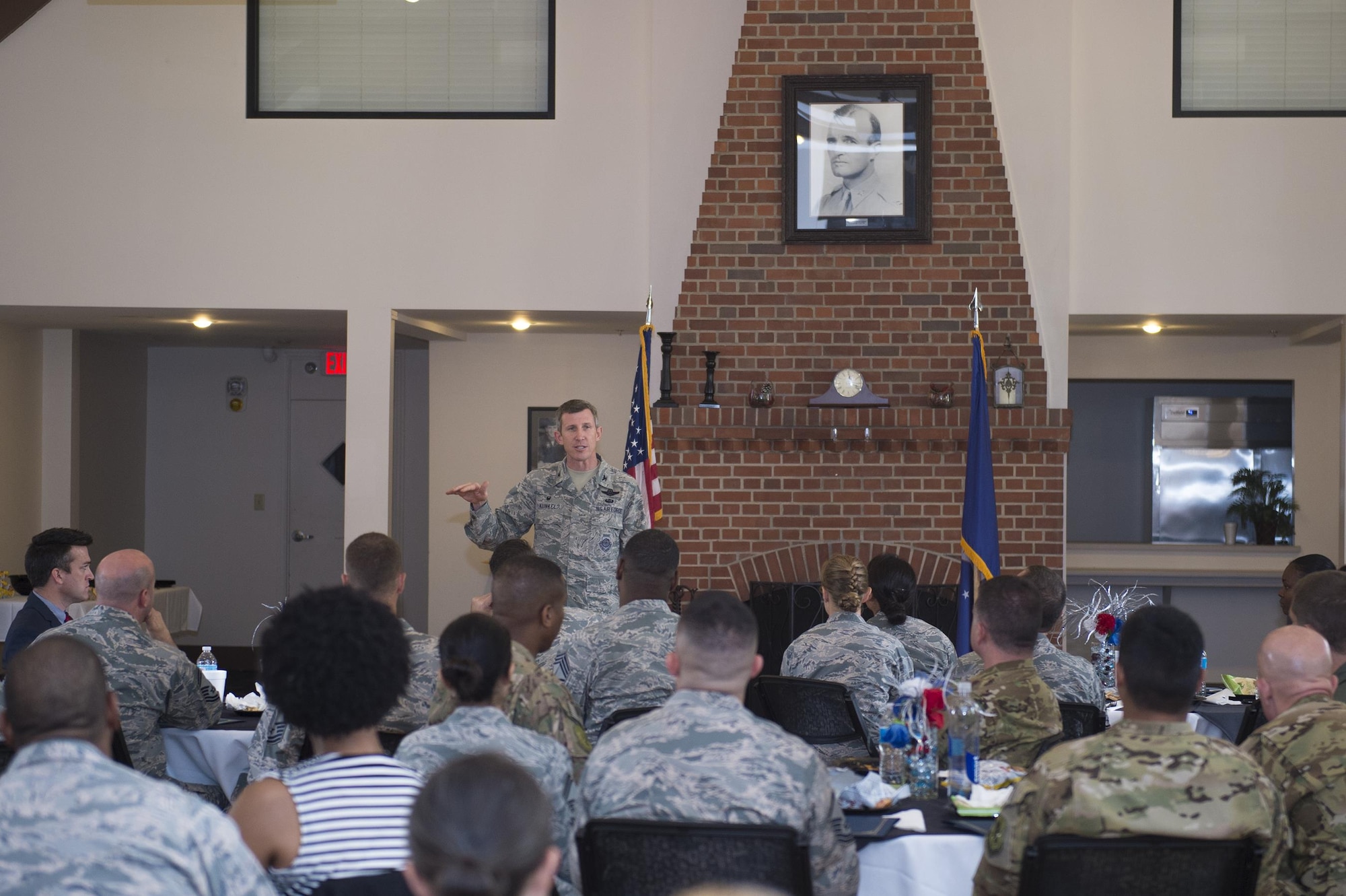 Col. Thomas Kunkel, 23d Wing commander, commends the students of the 2017 Emerge Moody, Leadership Moody classes during a graduation ceremony, June 23, 2017, at Moody Air Force Base, Ga. Kunkel encouraged the graduates to pay it forward and make their experience worth more by passing their newly gained skills to units to invest in themselves and others. During the nine-month program, Emerge Moody students broadened their view of how they fit into the overall Moody and larger Air Force mission, while Leadership Moody students learned local community agencies' best practices and challenges of leaders from non-military perspectives. (U.S. Air Force photo by Senior Airman Greg Nash)