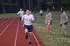 U.S. Air Force airmen run 1,000 meters during a German Armed Forces Badge for Military Proficiency test at Joint Base McGuire-Dix-Lakehurst, N.J., June 13, 2017. The test included an 1x10-meter sprint, flex arm hang, 1,000 meter run, 100 meter swim in Military Uniform, marksmanship, and a timed foot march. (U.S. Air National Guard photo by Master Sgt. Matt Hecht/Released)