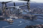 A set of MV-22B Osprey tiltrotor aircraft fly in formation above Sydney Harbor.  Below are the world-famous Sydney Opera House and Sydney Harbor Bridge. The MV-22Bs belong to Marine Medium Tiltrotor Squadron 265 (Reinforced), June 29, 2017. VMM-265 (Rein.) is part of the Aviation Combat Element of the 31st Marine Expeditionary Unit. The 31st MEU and the Bonhomme Richard Expeditionary Strike Group arrived in Sydney after transiting south across the vast Pacific Ocean, from Okinawa, Japan, to southeastern Australia in just over three weeks. Sydney is a favorite port stop for both Marines and Sailors crossing the Pacific. The 31st MEU partners with the Navy's Amphibious Squadron 11 to form the amphibious component of the Bonhomme Richard Expeditionary Strike Group. The 31st MEU and PHIBRON 11 combine to provide a cohesive blue-green team capable of accomplishing a variety of missions across the Indo-Asia-Pacific region. 