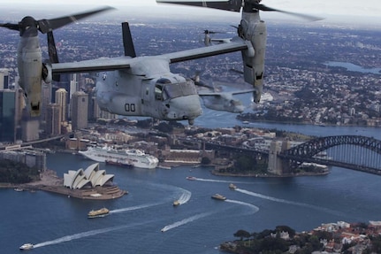 A set of MV-22B Osprey tiltrotor aircraft fly in formation above Sydney Harbor.  Below are the world-famous Sydney Opera House and Sydney Harbor Bridge. The MV-22Bs belong to Marine Medium Tiltrotor Squadron 265 (Reinforced), June 29, 2017. VMM-265 (Rein.) is part of the Aviation Combat Element of the 31st Marine Expeditionary Unit. The 31st MEU and the Bonhomme Richard Expeditionary Strike Group arrived in Sydney after transiting south across the vast Pacific Ocean, from Okinawa, Japan, to southeastern Australia in just over three weeks. Sydney is a favorite port stop for both Marines and Sailors crossing the Pacific. The 31st MEU partners with the Navy's Amphibious Squadron 11 to form the amphibious component of the Bonhomme Richard Expeditionary Strike Group. The 31st MEU and PHIBRON 11 combine to provide a cohesive blue-green team capable of accomplishing a variety of missions across the Indo-Asia-Pacific region. 