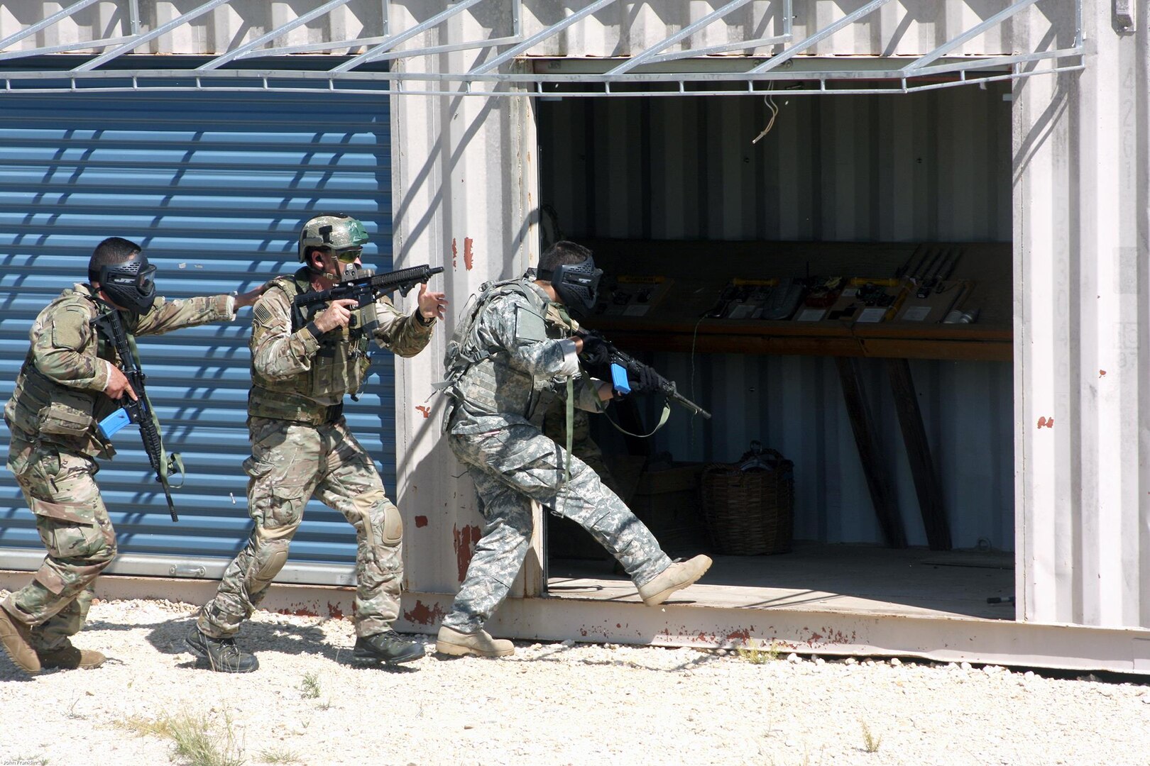 Emergency medicine doctors accompany 19th Special Forces Group personnel conducting a raid to seize an individual declared a high value target at Joint Base San Antonio-Camp Bullis as part of the Joint Emergency Medicine Exercise June 15. The exercise allows the doctors to observe what happens when there is a casualty and how the patient is treated and moved.