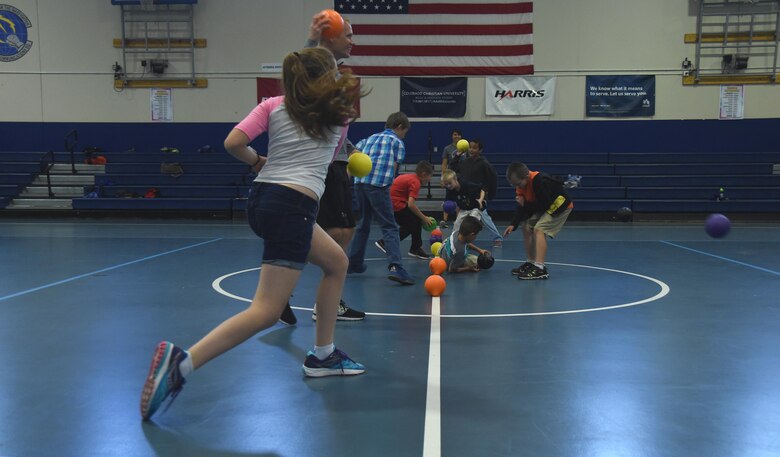 Summer Enrichment Program participants play a game of dodgeball at Schriever Air Force Base, Colorado, Monday, June 26, 2017. The Summer Enrichment Program spans two weeks and provides children activities during their summer break. (U.S. Air Force photo/Senior Airman Arielle Vasquez)