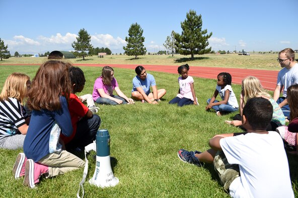 Children attending the Summer Enrichment Program socialize each other at Schriever Air Force Base, Colorado, Monday, June 26, 2017. This year marks the second time the base hosted this program.(U.S. Air Force photo/Senior Airman Arielle Vasquez)