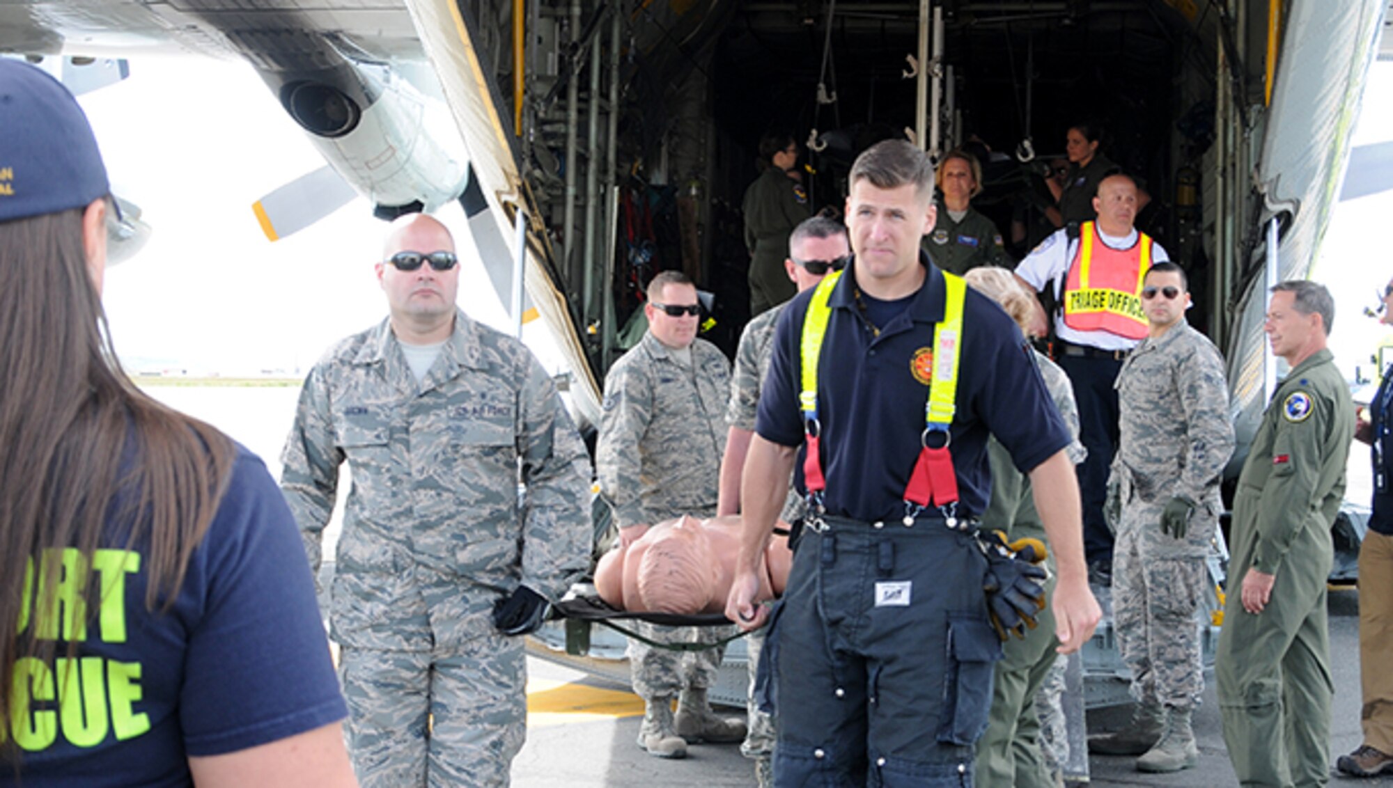 Twelve airmen from the 104th Medical Group and seven airmen from the 102nd Medical Group participated in a mass casualty training at the Earhart Terminal at Logan Airport in Boston Massachusetts.  Also present were members of the 139th Aeromedical Evacuation Squadron, part of the 109th Airlift Wing at Stratton Air National Guard Base, Scotia NY, who came in on the C-130 where most of the exercise took place.  (U.S. Air National Guard Photos by Tech. Sgt. Lindsey Sarah Watson-Kirwin)
