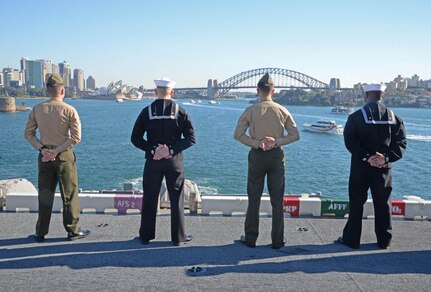Sailors and Marines man the rails as the amphibious assault ship USS Bonhomme Richard (LHD 6) pulls into the Sydney Harbor as part of a port visit, June 29,2017. Bonhomme Richard is in Sydney to advance U.S. – Australian relations ahead of the bilateral training exercise Talisman Saber. During the visit, Bonhomme Richard will host a reception, ships tours and experience the culture of the historic city. 