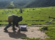 MARINE CORPS BASE CAMP PENDLETON, Calif.—A Marine with Explosive Ordnance Disposal detachment, Combat Logistic Battalion 15 attached to the 15th Marine Expeditionary Unit prepares to use X-Ray equipment to gain better situational awareness of a suspected improvised explosive device as he conducts IED training aboard Camp Pendleton, Feb. 22, 2017. The EOD Technicians, like all other forces of the 15th MEU, undergo critical training prior to deploying to ensure they can operate in any hostile mission area.
(USMC photo by Lance Cpl. Jacob Pruitt)