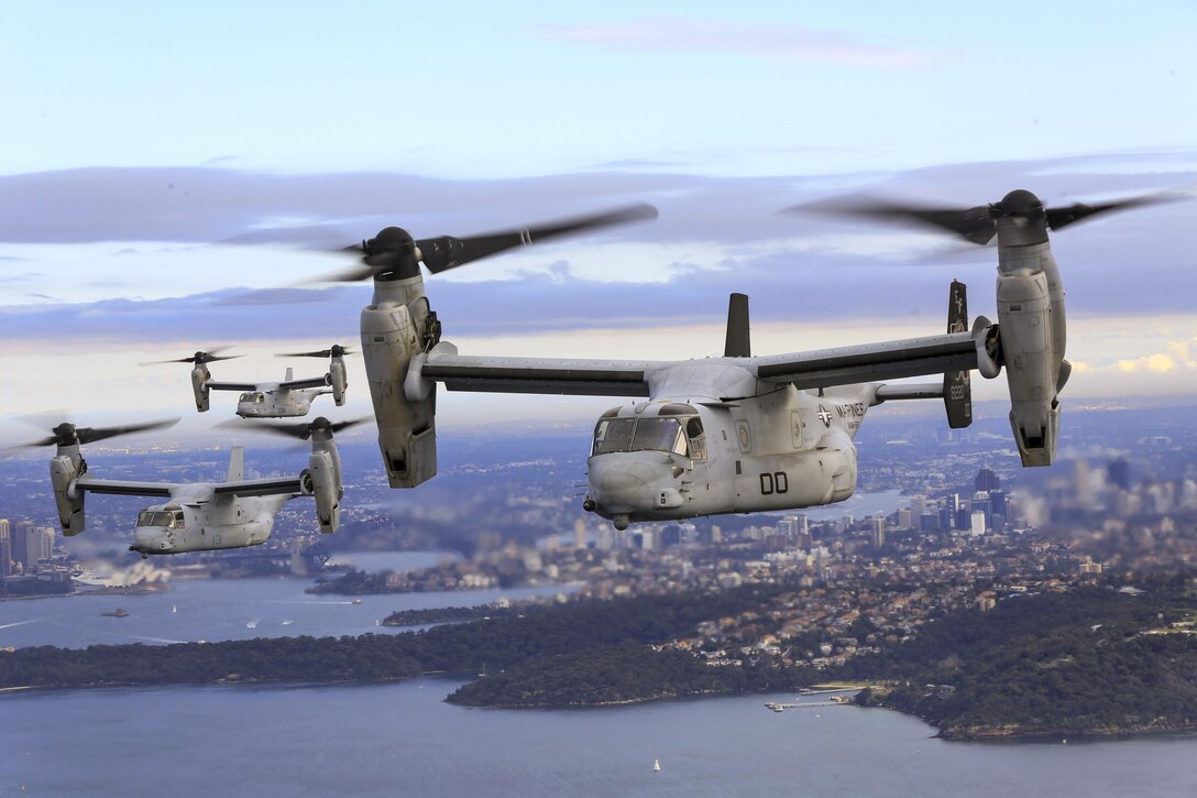 Marine Corps MV-22B Osprey tiltrotor aircraft fly in formation over the Pacific Ocean off the coast of Sydney, June 29, 2017. The aircraft are assigned to Marine Medium Tiltrotor Squadron 265. Marine Corps photo by Lance Cpl. Amy Phan