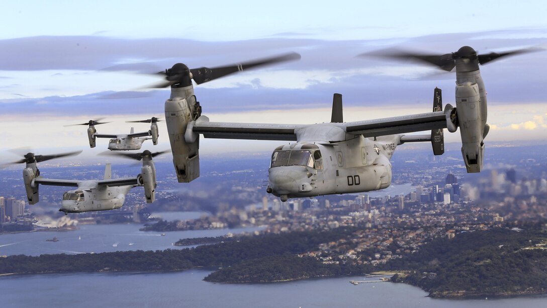 Marine Corps MV-22B Osprey tiltrotor aircraft fly in formation over the Pacific Ocean off the coast of Sydney, June 29, 2017. The aircraft are assigned to Marine Medium Tiltrotor Squadron 265. Marine Corps photo by Lance Cpl. Amy Phan