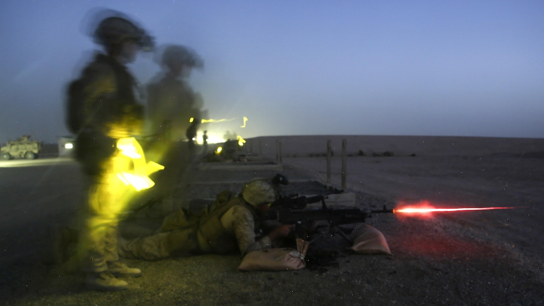 A Marine fires an M240L machine gun during a night live-fire training exercise at Camp Shorabak, Afghanistan, June 25, 2017. The Marine is assigned to Task Force Southwest. Marine Corps photo by Sgt. Lucas Hopkins