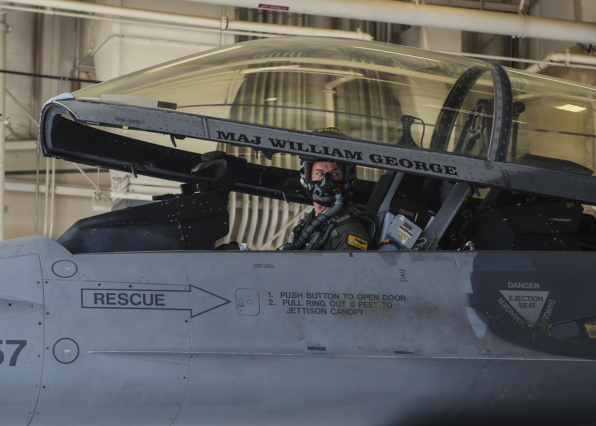 Maj. John R. Widmer, 314th Fighter Squadron flight commander and an F-16 instructor pilot, prepares to take flight in an F-16 Fighting Falcon at Holloman Air Force Base, N.M. June 23, 2017. Widmer was recently recognized as the Air Force’s Fighter Instructor Pilot of the Year for his exemplary performance in and out of the jet. (U.S. Air Force photo by Airman 1st Class Alexis Docherty)