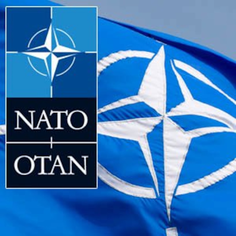 NATO seal and flag.