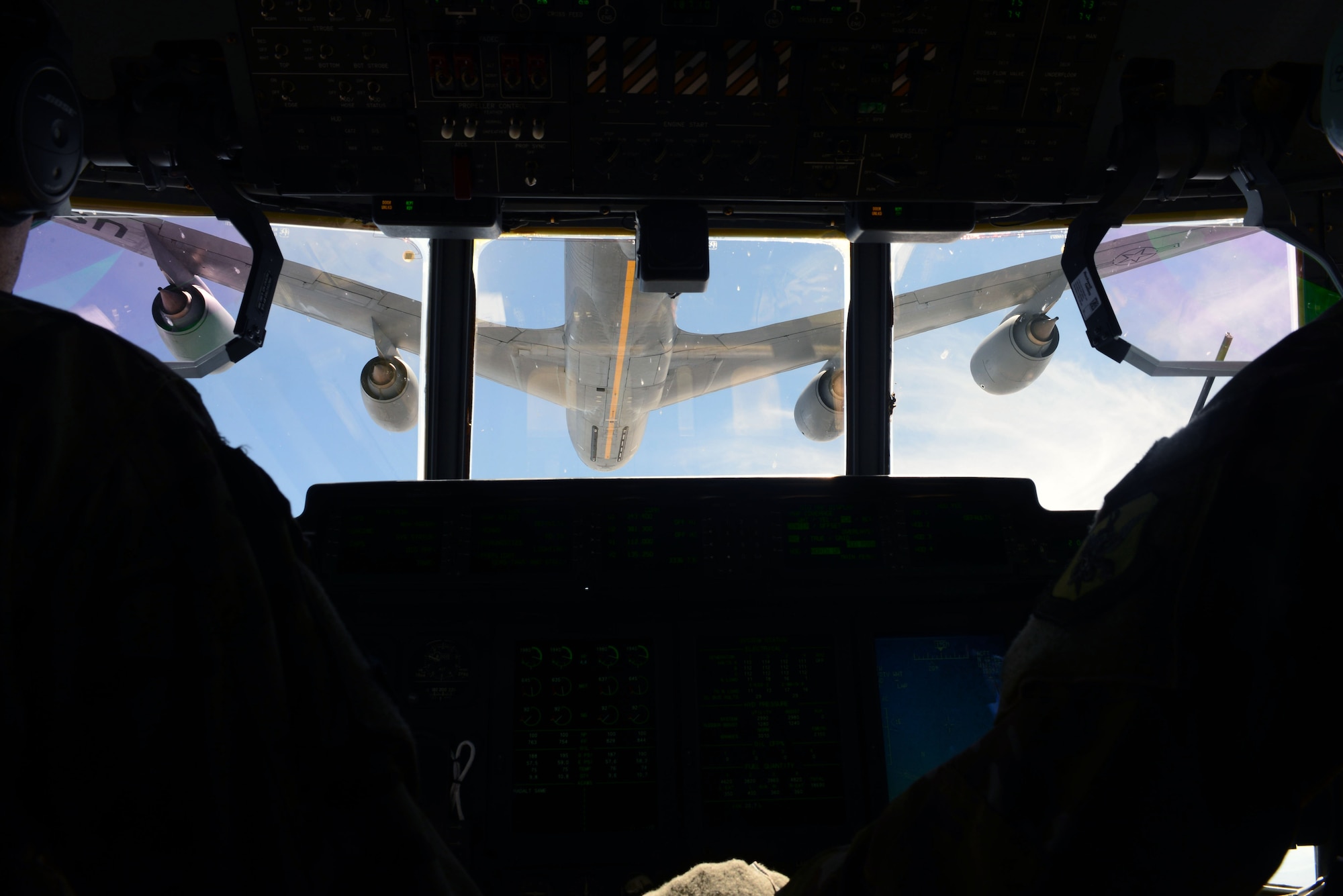 A C-130 Super Hercules prepares to be refueled by a KC-135 Stratotanker during exercise Combat Raider near Ellsworth Air Force Base, S.D., June 28, 2017. The exercise consisted of 22 aircraft from eight military units providing over 100 service members with realistic training scenarios. (U.S. Air Force photo by Airman 1st Class Donald C. Knechtel)