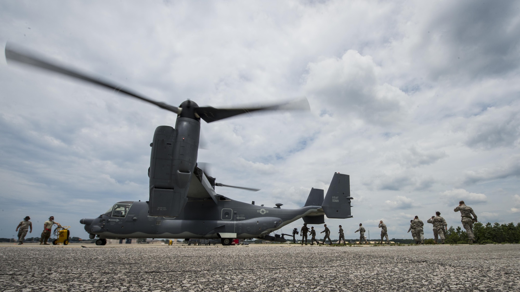 Junior ROTC cadets board an 8th Special Operations Squadron CV-22 Osprey tiltrotor aircraft at Hurlburt Field, Fla., June 27, 2017. More than 55 JROTC cadets from nearby high schools flew in a CV-22 and a 15th SOS MC-130H Combat Talon II as part of a JROTC familiarization flight. (U.S. Air Force photo by Airman 1st Class Joseph Pick)