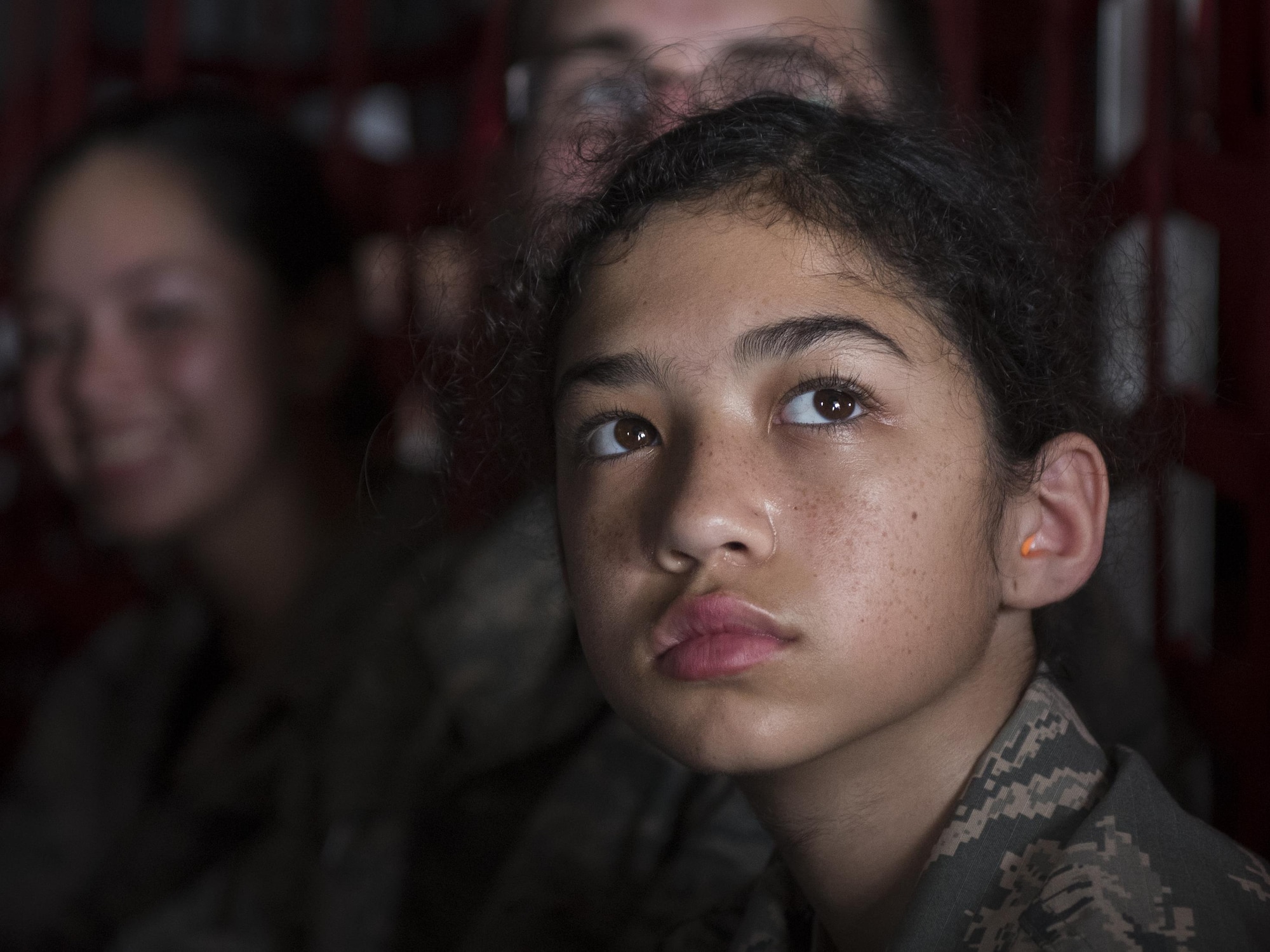 A Junior ROTC cadet scans the sky during a 15th Special Operations Squadron MC-130H Combat Talon II familiarization flight above northwest Florida, June 27, 2017. More than 55 JROTC cadets from nearby high schools flew in a MC-130H and an 8th SOS CV-22 Osprey tiltrotor aircraft as part of a JROTC familiarization flight. (U.S. Air Force photo by Airman 1st Class Joseph Pick)