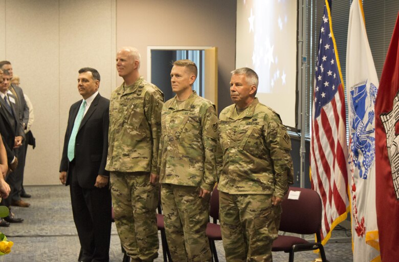 Col. Paul E. Owen took command of the Southwestern Division today in a ceremony officiated by Lt. Gen. Todd T. Semonite, Chief of Engineers and Commanding General of the U.S. Army Corps of Engineers.

The official party (left) Mark L. Mazzanti, SES Director of Programs, Southwestern Division, SWD incoming Commander Col. Paul E. Owen, SWD outgoing Commander Brig. Gen. David C. Hill, USACE Commander Lt. Gen. Todd T. Semonite.